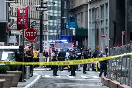 New York police shut off street near the Fulton Street subway station as police said they were investigating two suspicious packages in Manhattan, New York