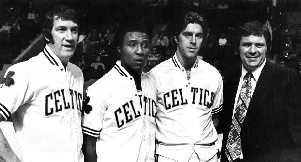 Boston Celtics’ John Havlicek, JoJo White, and Dave Cowens stand with head coach Tom Heinsohn. The Boston Celtics host the <a class="link " href="https://sports.yahoo.com/nba/teams/chicago/" data-i13n="sec:content-canvas;subsec:anchor_text;elm:context_link" data-ylk="slk:Chicago Bulls;sec:content-canvas;subsec:anchor_text;elm:context_link;itc:0">Chicago Bulls</a> in a regular-season NBA basketball game at the Boston Garden on Jan. 9, 1974. (Frank O’Brien/Boston Globe via Getty Images)