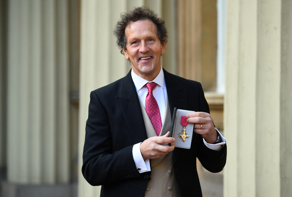 British broadcaster and horticulturalist Monty Don poses with his medal after being appointed an Officer of the Order of the British Empire (OBE) for services to broadcasting and charity during an investiture ceremony at Buckingham Palace in London on December 20, 2018. (Photo by Kirsty O'Connor/AFP via Getty Images)