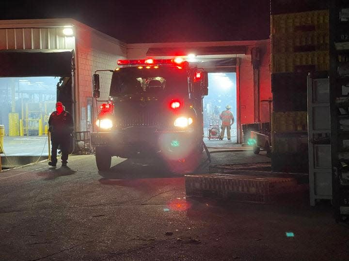 Firefighters backed an engine to a loading dock off Gage Street and worked to ventilate heavy smoke inside the building while others extinguished a small fire.