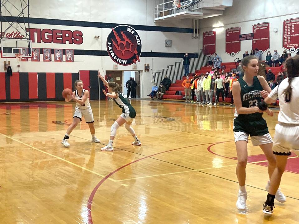 Fairview's Brenna Cronin, left, is guarded by Mercyhurst Prep's Anna Tranum while Olivia Kulyk guards Ella Garrity in the foreground on Monday, Jan. 24, 2022, at Fairview High School.