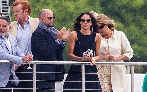 Meghan Markle watches Prince Harry play polo at Coworth Park - Credit: David Hartley