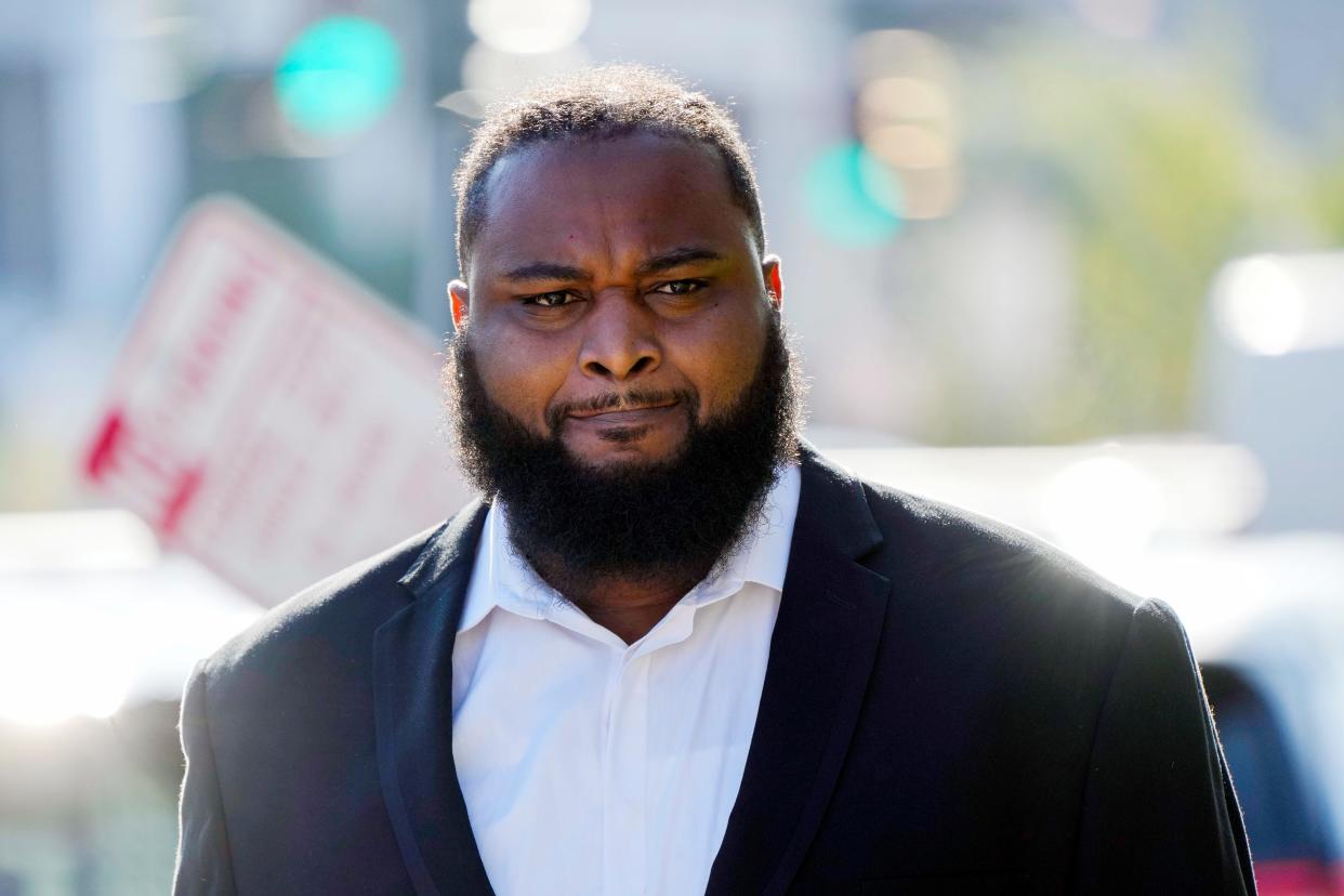 FILE - Cardell Hayes enters Orleans Parish Criminal District Court in New Orleans, Wednesday, Sept. 20, 2023, for a hearing regarding his retrial for shooting former NFL star Will Smith. Closing arguments were slated for Friday, Jan. 26, 2024, in the manslaughter retrial of Hayes, who fatally shot former New Orleans Saints star Will Smith following a traffic crash almost eight years ago. (AP Photo/Gerald Herbert, File)