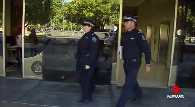 Senior Constable Natasha Parsons (left) leaves court with a fellow officer. Picture: 7 News