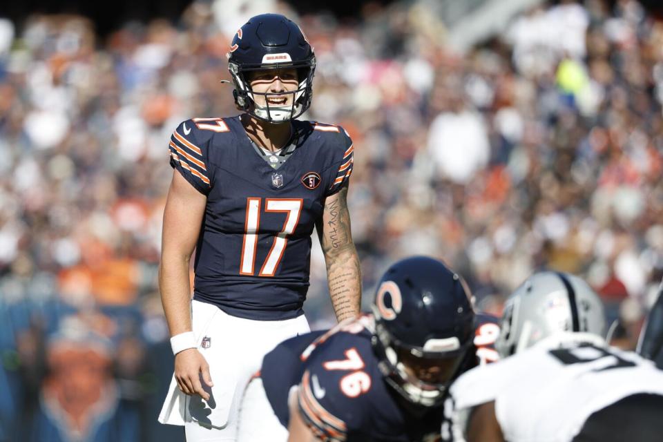 Bears quarterback Tyson Bagent (17) looks over the Raiders defense.