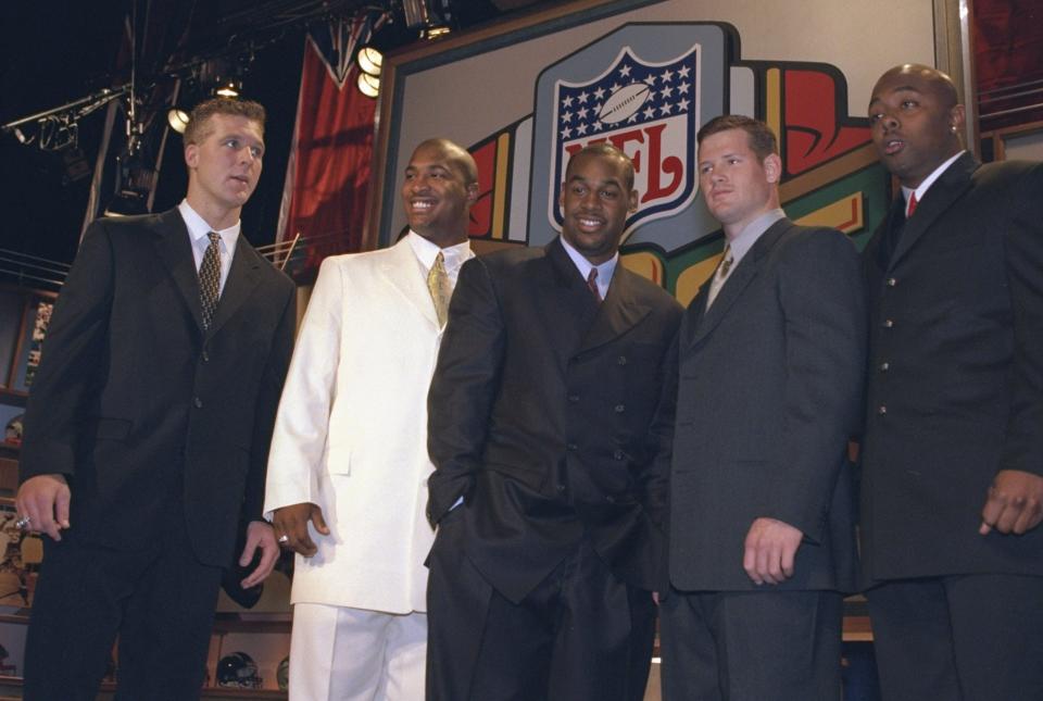 APRIL 17, 1999: Quarterbacks Tim Couch, Daunte Culpepper, Donovan McNabb, Cade McNown and  Akili Smith pose for a picture during the NFL Draft at the Madison Square Garden in New York, New York.