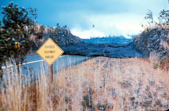 Lava covers a road in Hawaii Volcano National Park in 1969.