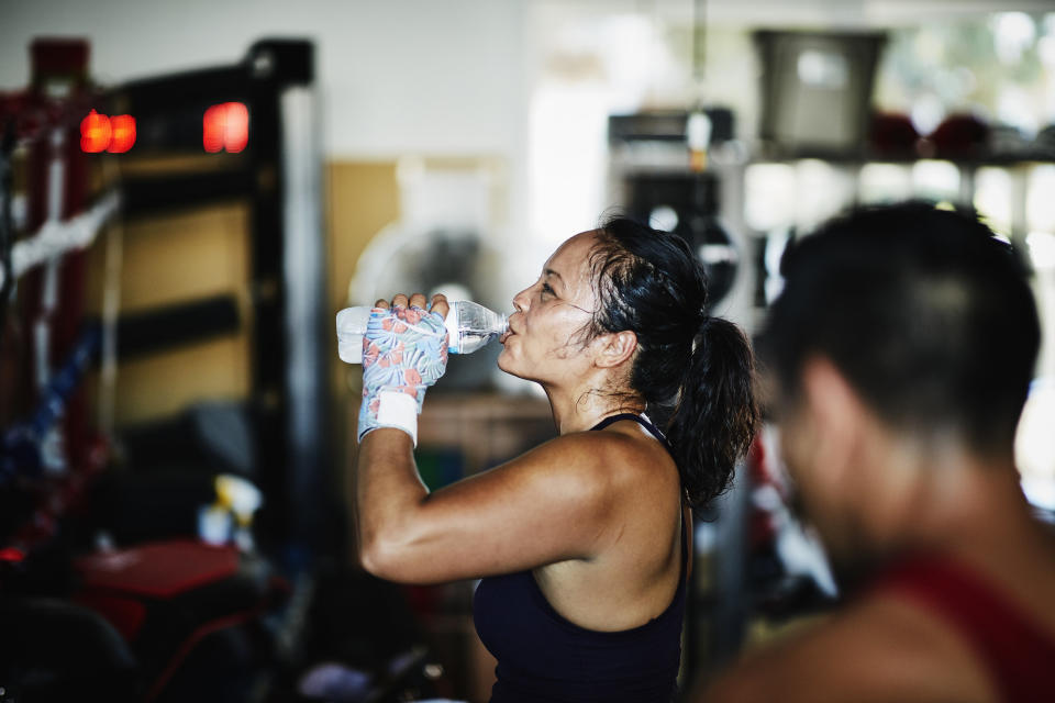 Woman sweating at gym