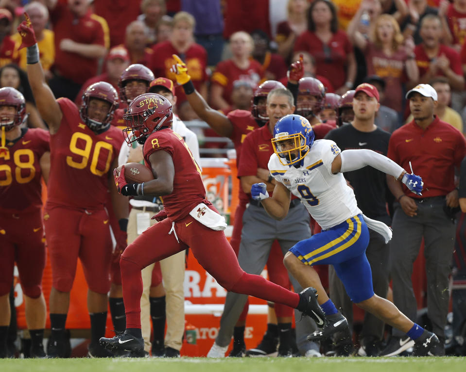 Iowa State wide receiver Deshaunte Jones, left, breaks away from South Dakota State cornerback Jordan Brown, right, to score a touchdown during the first half of an NCAA college football game, Saturday, Sept. 1, 2018, in Ames, Iowa. (AP Photo/Matthew Putney)