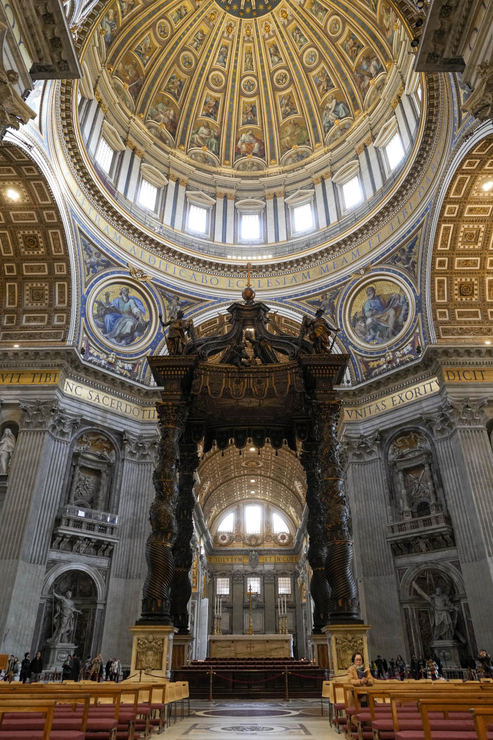 A view of the 17th century, 95ft-tall bronze canopy by Giovan Lorenzo Bernini surmounting the papal Altar of the Confession in St. Peter's Basilica at the Vatican, Wednesday, Jan. 10, 2024. Vatican officials unveiled plans Thursday, Jan.11, for a year-long, 700,000 euro restoration of the monumental baldacchino, or canopy, of St. Peter's Basilica, pledging to complete the first comprehensive work on Bernini's masterpiece in 250 years before Pope Francis' big 2025 Jubilee. (AP Photo/Andrew Medichini)