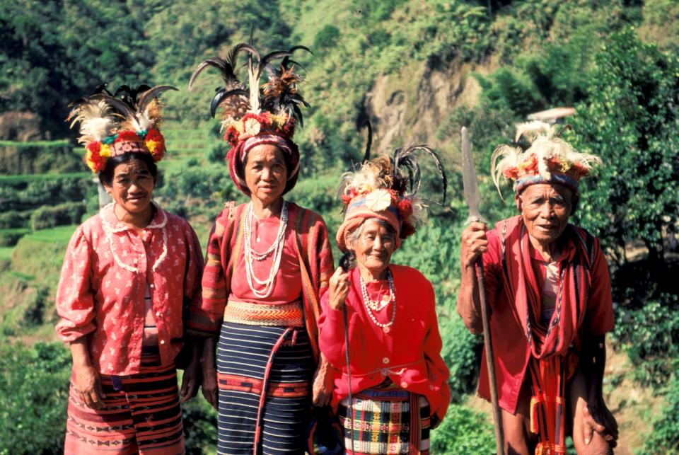 Ifugao women show their traditional costumes as they stand among rice terraces built by their ancestors and maintained by&nbsp;the tribe.