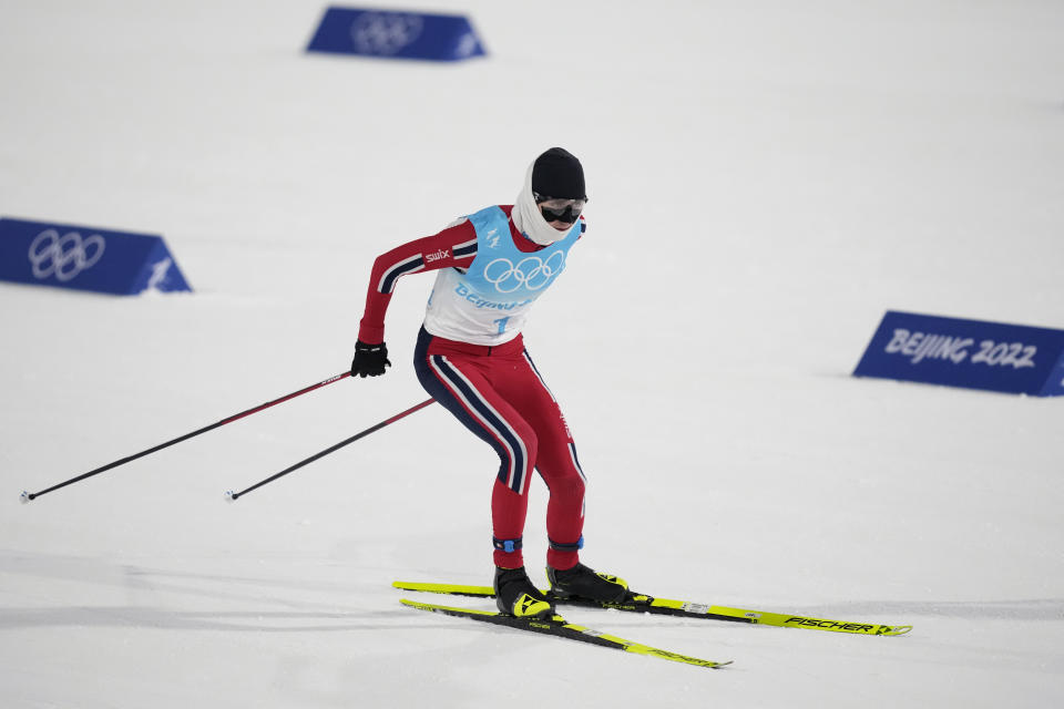 Norway's Jarl Magnus Riiber competes during the cross-country skiing portion of the individual Gundersen large hill/10km competition at the 2022 Winter Olympics, Tuesday, Feb. 15, 2022, in Zhangjiakou, China. (AP Photo/Aaron Favila)