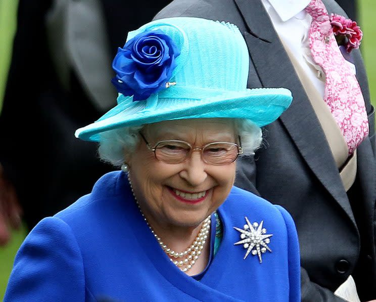 <i>The Queen usually wears colourful looks to Royal Ascot [Photo: PA]</i>