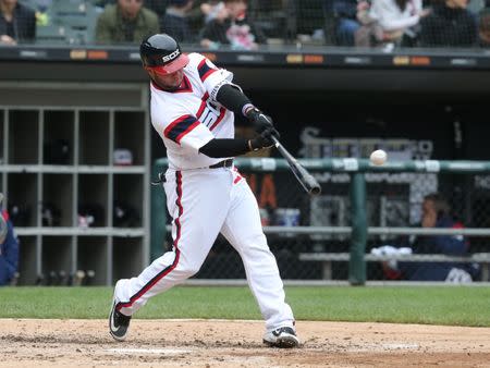 May 20, 2018; Chicago, IL, USA; Chicago White Sox catcher Welington Castillo (21) hits a single during the fourth inning against the Texas Rangers at Guaranteed Rate Field. Mandatory Credit: Dennis Wierzbicki-USA TODAY Sports