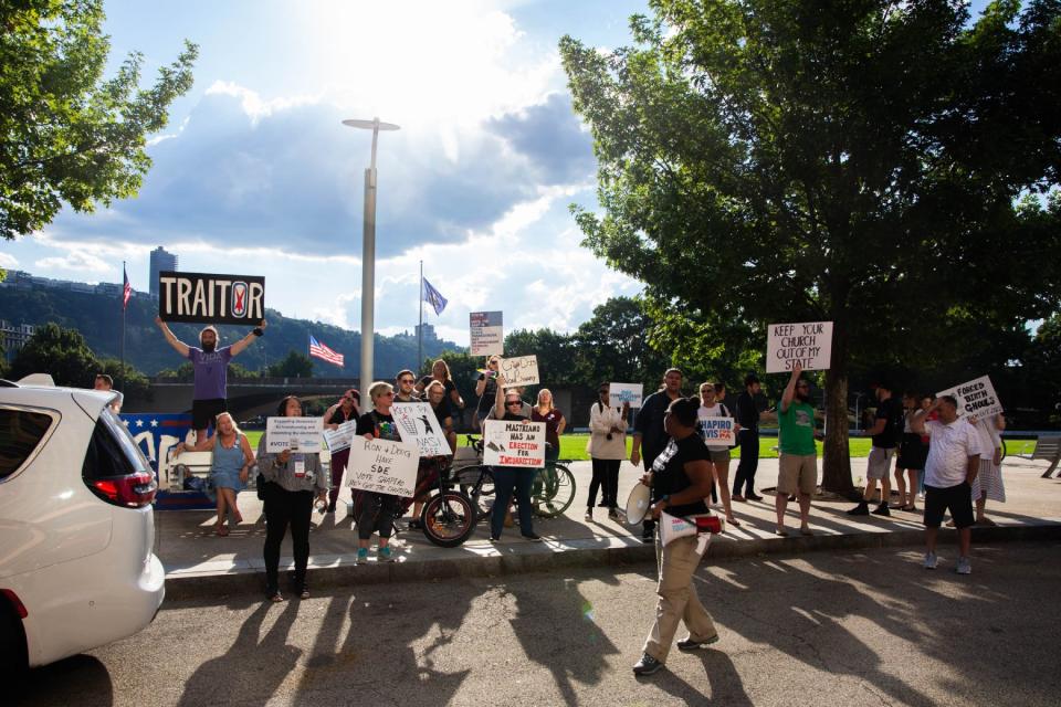 Protestors assemble outside a rally for Pennsylvania Republican gubernatorial candidate Doug Mastriano in Pittsburgh, Pa. on Aug. 19, 2022. (Photo by Jack Crosbie for Rolling Stone)
