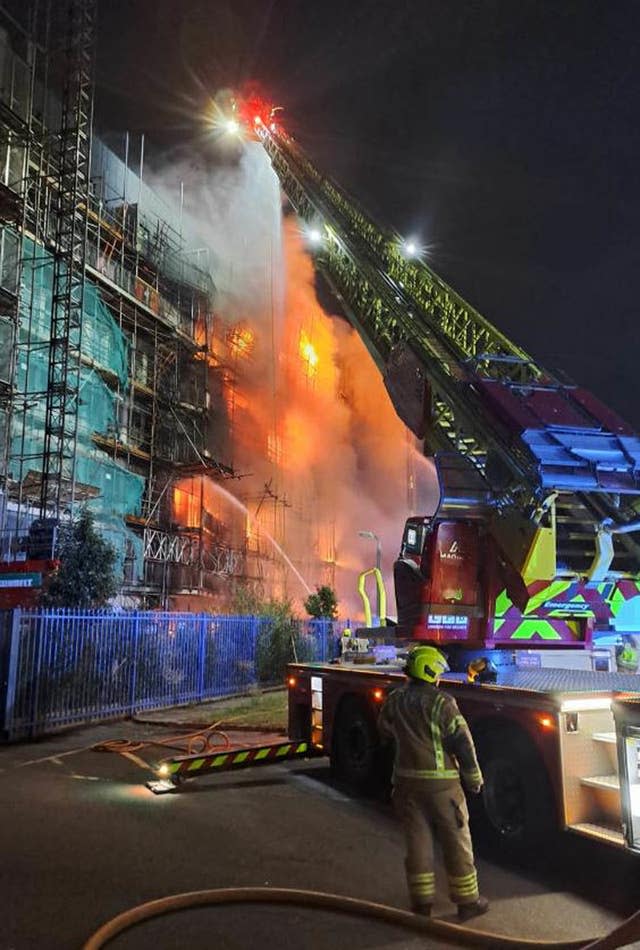 Firefighters tackle the blaze at a multi-storey building in Dagenham