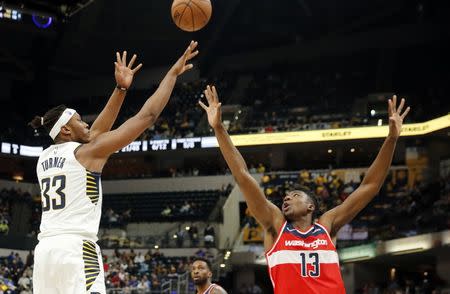 Dec 10, 2018; Indianapolis, IN, USA; Indiana Pacers center Myles Turner (33) takes a shot against Washington Wizards center Thomas Bryant (13) during the third quarter at Bankers Life Fieldhouse. Brian Spurlock-USA TODAY Sports