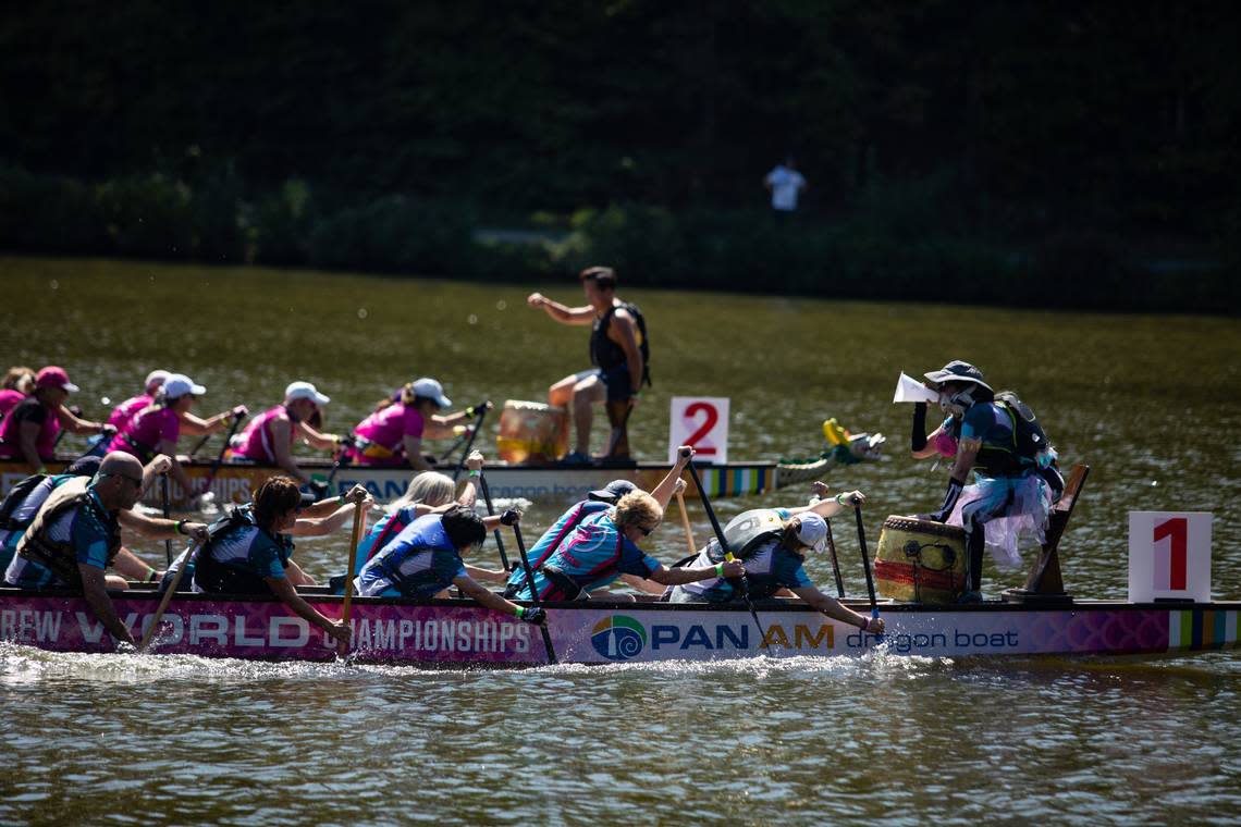 The Chemo-Kazes pull ahead of a competing team during their winning heat at Asia Fest on Sept. 17, 2022, at Booth Amphitheatre in Cary, N.C. The group is made up of survivors of cancer or other illnesses and their caregivers.