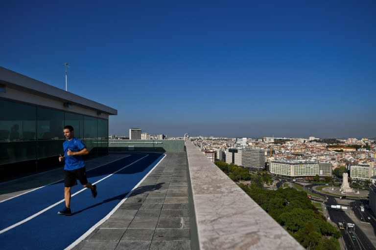 An outdoor running track on top of the 10-story Four Seasons Hotel Ritz offers a birds-eye view of Lisbon