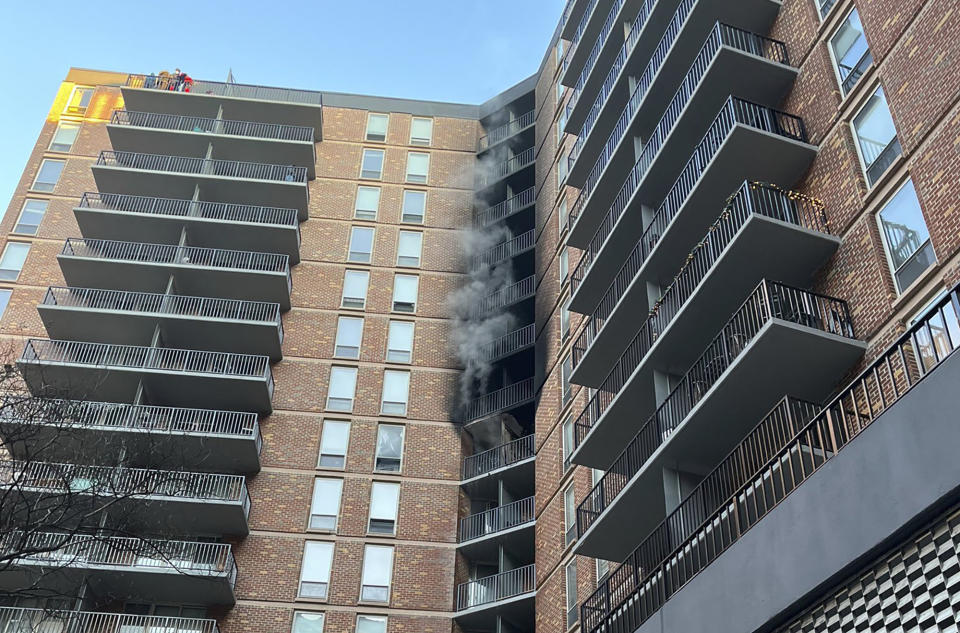 In this photo provided by Montgomery County (Maryland) Fire & Rescue Service, smoke billows from a fire at a high-rise apartment building, Saturday, Feb. 18, 2023, in Silver Springs, Md. (Montgomery County Fire & Rescue Service via AP)