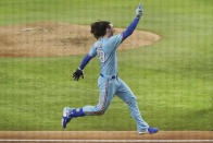 Texas Rangers designated hitter Jonah Heim celebrates as he heads to home plate after hitting the game-winning home run in the ninth inning of a baseball game against the Seattle Mariners Sunday, Aug.1, 2021, in Arlington, Texas. (AP Photo/Louis DeLuca)