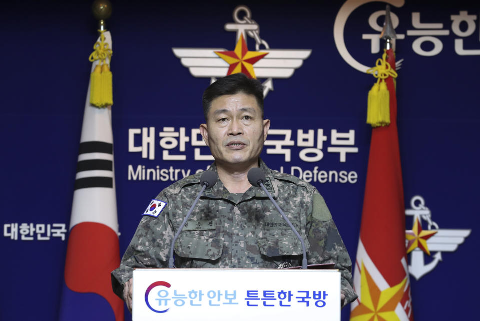 South Korea's Director of Operations in Joint Chiefs of Staff Jeon Dong jin briefs to the media at the Defense Ministry in Seoul, South Korea, Thursday, Nov. 28, 2019. North Korea on Thursday fired two unidentified projectiles into the sea, South Korea's military said, three days after the North said its troops conducted artillery drills near its disputed sea boundary with South Korea. (Yun Dong-jin/Yonhap via AP)