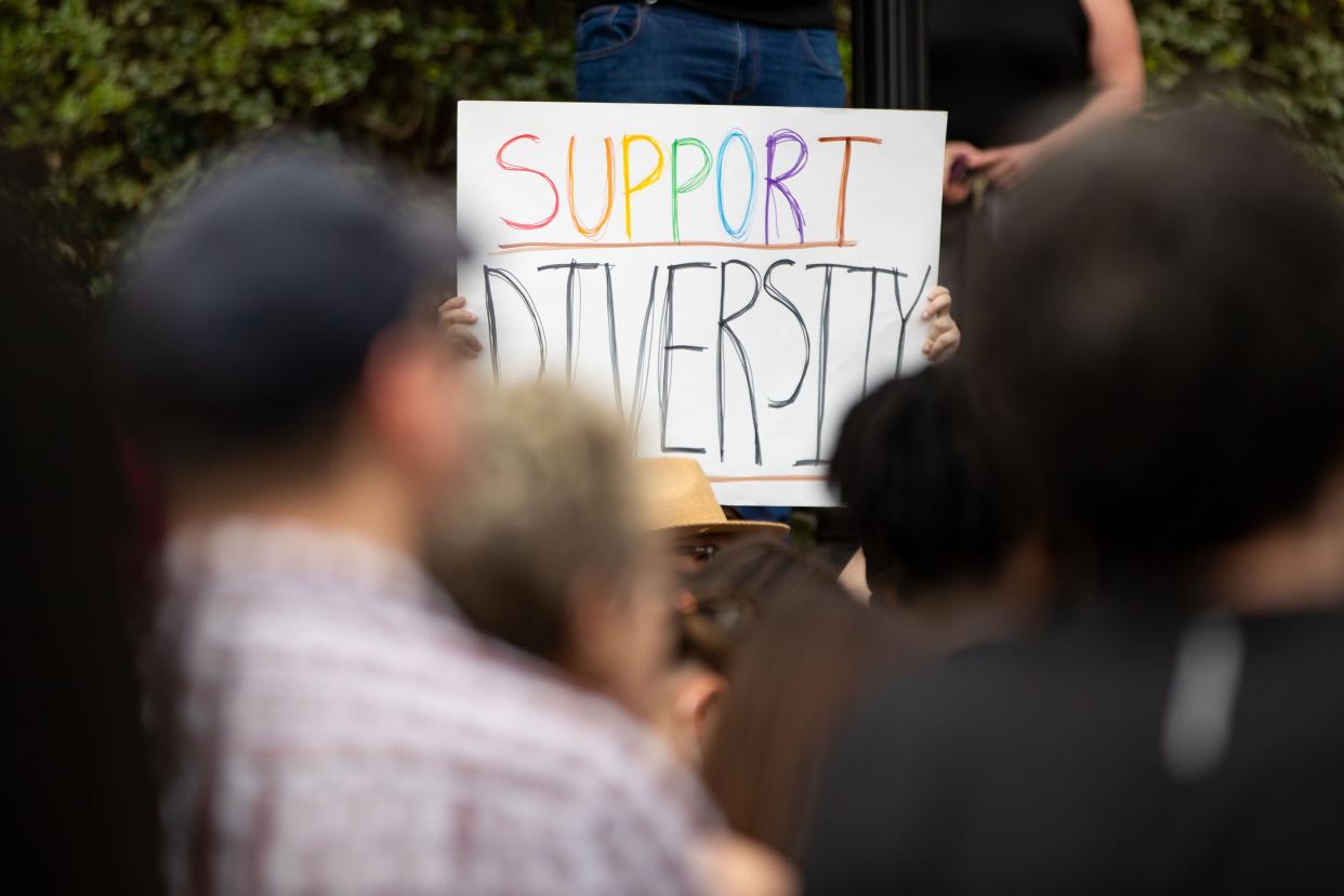 More than 100 people gathered in front of the Westcott Building on Florida State University's campus to protest the DeSantis administration's "attack" on the LGBTQ+ and Black, Indigenous and People of Color (BIPOC) communities on Thursday, Feb. 23, 2023.