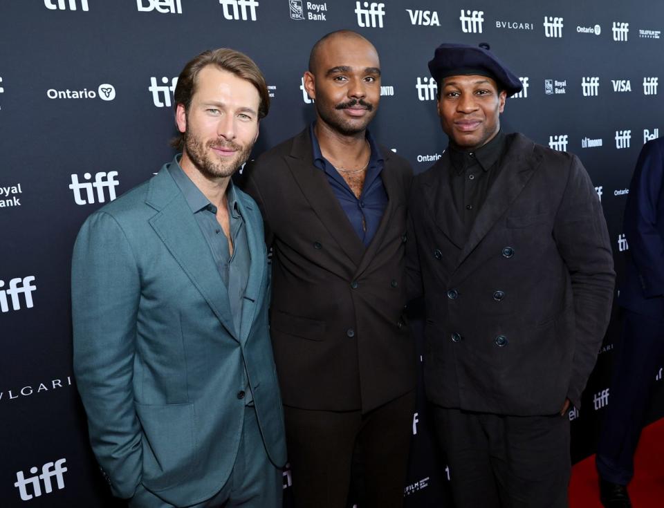 Glen Powell, JD Dillard, and Jonathan Majors attend the “Devotion” TIFF premiere - Credit: Getty Images
