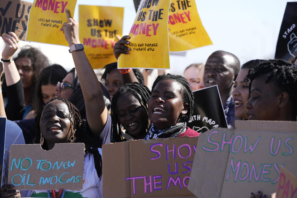 Demonstrators participate in a Fridays for Future protest calling for money for climate action at the COP27 U.N. Climate Summit, Friday, Nov. 11, 2022, in Sharm el-Sheikh, Egypt. (AP Photo/Peter Dejong)