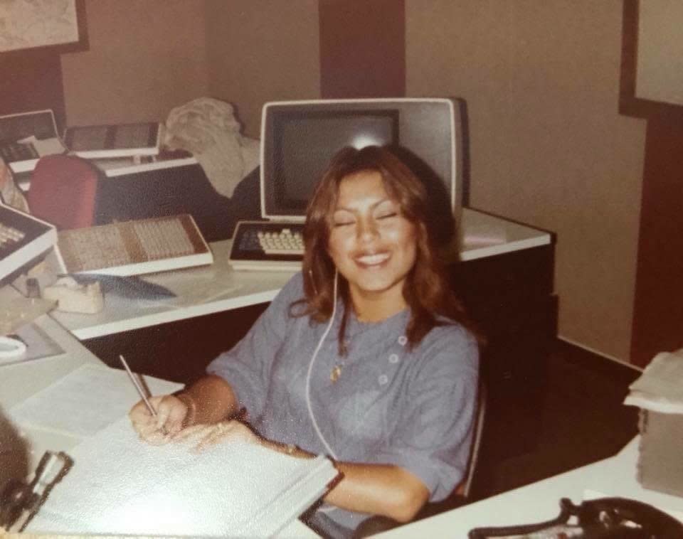 "Here's my&nbsp;mom&nbsp;Aleyda&nbsp;working at the Culver City Police Department in Southern California. I just love how it shows how happy she was. She absolutely loved being a dispatcher and she says it was the people that she worked with that made her job easier to handle." -- <i>Kristine</i>