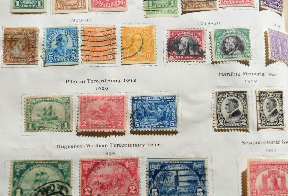 A page from the album of stamp collector Peter Bono of Yarmouth Port features a trio of stamps from 1920 celebrating the tercentenary of the Pilgrims' arrival in Plymouth.