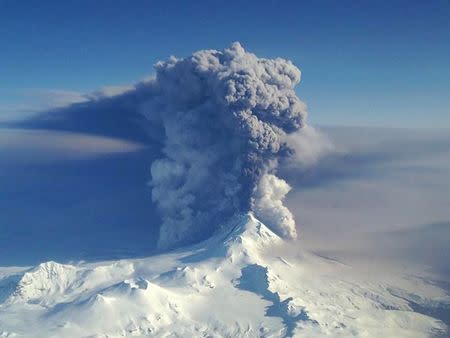 The Pavlof Volcano spews ash in the Aleutian Islands of Alaska in this U.S. Coast Guard handout photo taken March 28, 2016. REUTERS/US Coast Guard/Lieutenant Commander Nahshon Almandmoss/Handout via Reuters