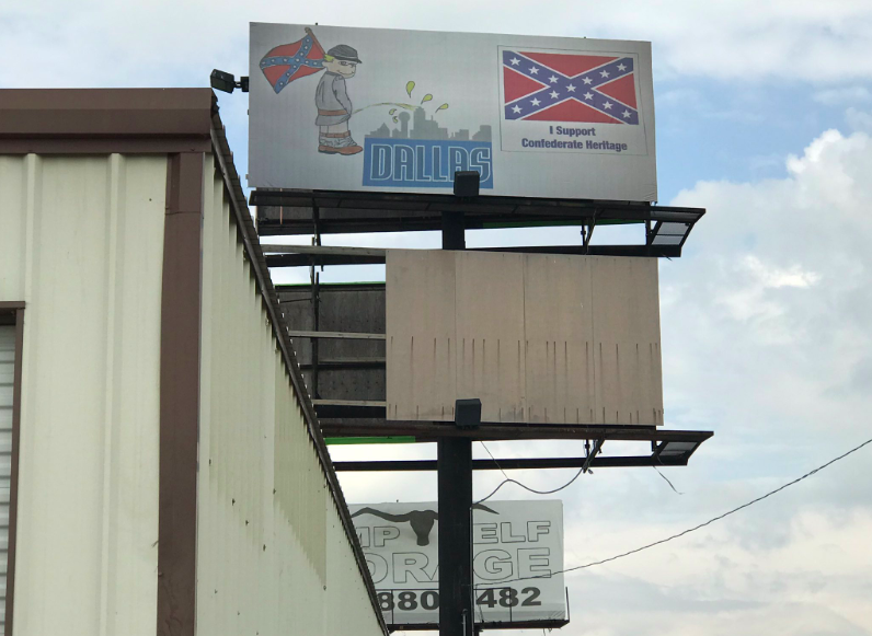 A billboard depicting a cartoon character urinating on the city of Dallas appears to be a response to the city’s decision to remove Confederate monuments. (Photo: <a href="https://twitter.com/cgreeneWFAA/status/1108420336863842304" rel="nofollow noopener" target="_blank" data-ylk="slk:Courtesy of Twitter/Cleo Greene;elm:context_link;itc:0;sec:content-canvas" class="link ">Courtesy of Twitter/Cleo Greene</a>)