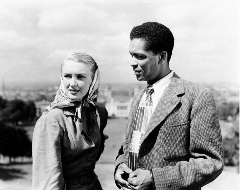 With Susan Shaw in Pool of London (1951), directed by Basil Dearden; the film caused something of a sensation for featuring the first interracial relationship in a British film - Alamy