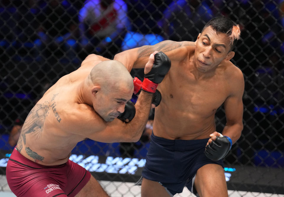 LAS VEGAS, NEVADA – AUGUST 08: (R-L) Kevin Borjas of Peru punches Victor Dias of Brazil in a flyweight fight during Dana White’s Contender Series season seven, week one at UFC APEX on August 08, 2023 in Las Vegas, Nevada. (Photo by Al Powers/Zuffa LLC)