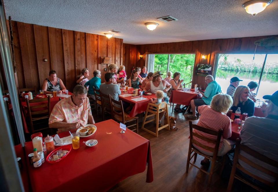 Customers dine on fine foods at  Gator's Seafood in Milton, Saturday, July 17, 2021.