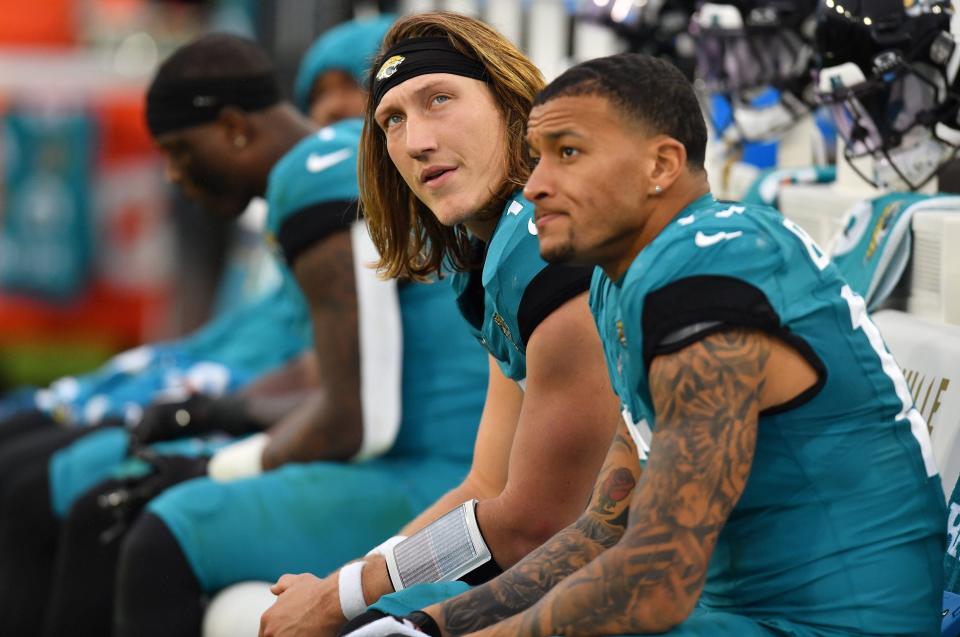 Jacksonville Jaguars quarterback Trevor Lawrence (16) and teammate Jacksonville Jaguars tight end Evan Engram (17) on the bench as the final minutes tick off the clock during Sunday's loss to the 49ers. The Jacksonville Jaguars hosted the San Francisco 49ers at EverBank Stadium in Jacksonville, FL Sunday, November 12, 2023. The Jaguars trailed 13 to 3 at the half and fell to the 49ers with a final score of 34 to 3. [Bob Self/Florida Times-Union]