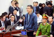 PVC's former chairman Trinh Xuan Thanh (C) stands at the court in Hanoi, Vietnam January 8, 2018. VNA/Doan Tan via REUTERS/Files