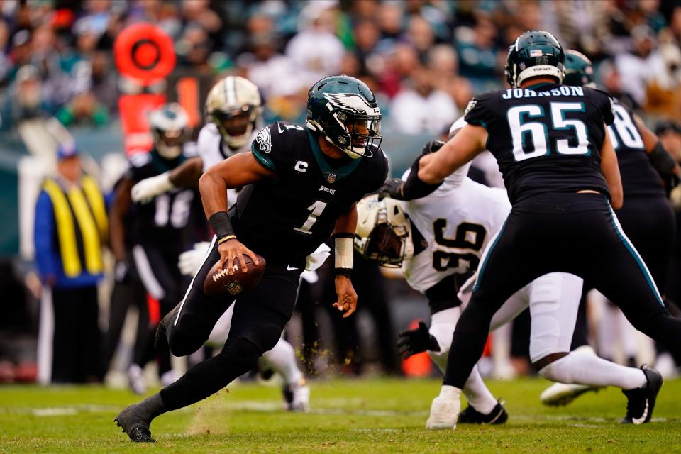 Philadelphia Eagles' Jalen Hurts plays during the first half of an NFL football game against the New Orleans Saints, Sunday, Nov. 21, 2021, in Philadelphia. (AP Photo/Derik Hamilton)