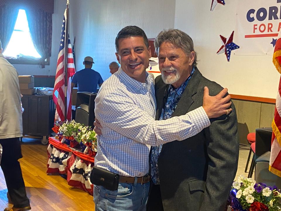 Ed Correira, right, takes a photo with friend and supporter City Councilor Lawrence Quintal at Correira's kickoff event for his campaign for mayor at the Portuguese American Civic Club on Wednesday night, June 21, 2023.