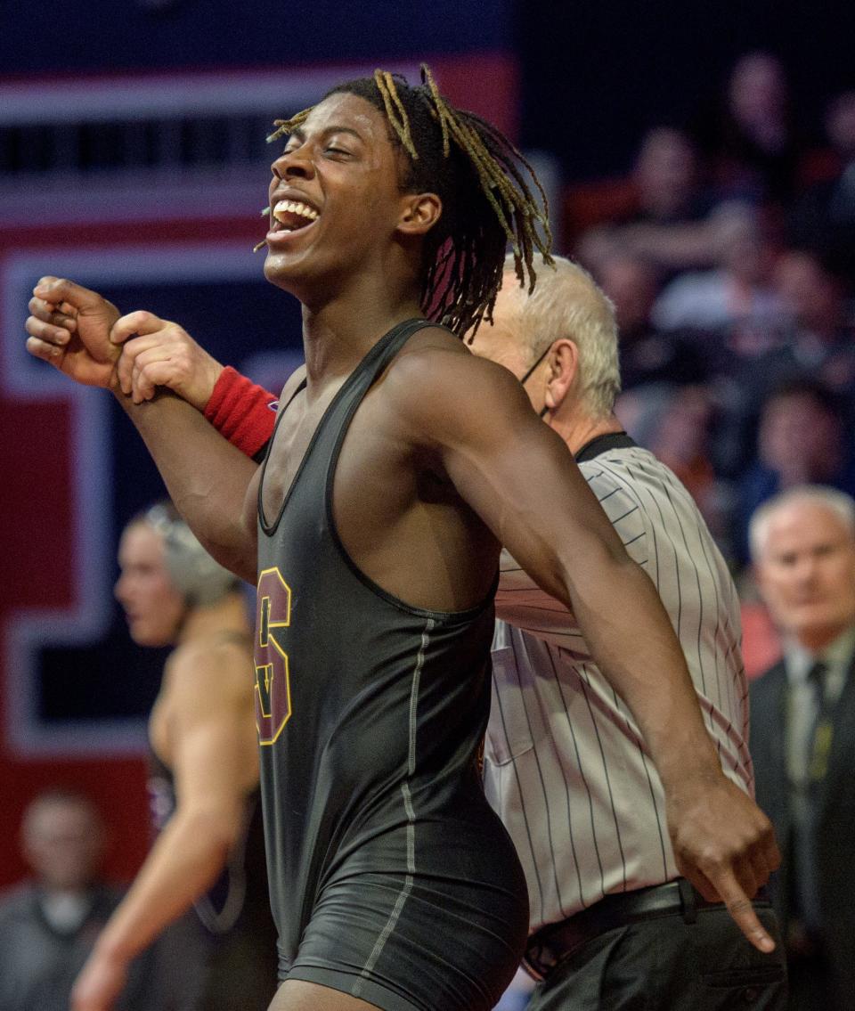 Lena-Winslow/Stockton's Marey Roby is all smiles after defeating Oakwood's Joe Lashuay in the Class 1A 160-pound state title match Saturday, Feb. 19, 2022 at the State Farm Center in Champaign.