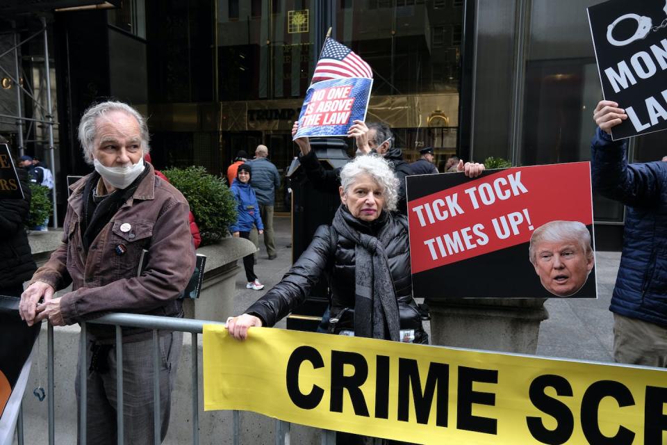 People gather March 31, 2023, in front of Trump Tower the day after former President Donald Trump was indicted by a New York grand jury. <a href="https://media.gettyimages.com/id/1478450097/photo/new-york-grand-jury-votes-to-indict-former-president-trump.jpg?s=1024x1024&w=gi&k=20&c=Ag1AulWVzDnb7sWWsexkgNF670B17M9sXz8psVI7uwk=" rel="nofollow noopener" target="_blank" data-ylk="slk:Spencer Platt/Getty Images;elm:context_link;itc:0;sec:content-canvas" class="link ">Spencer Platt/Getty Images</a>