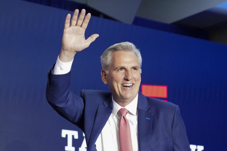 House Minority Leader Kevin McCarthy of Calif., waves as he arrives to speak at an election event, early Wednesday, Nov. 9, 2022, in Washington. (AP Photo/Alex Brandon)