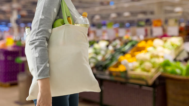 person carrying tote bag