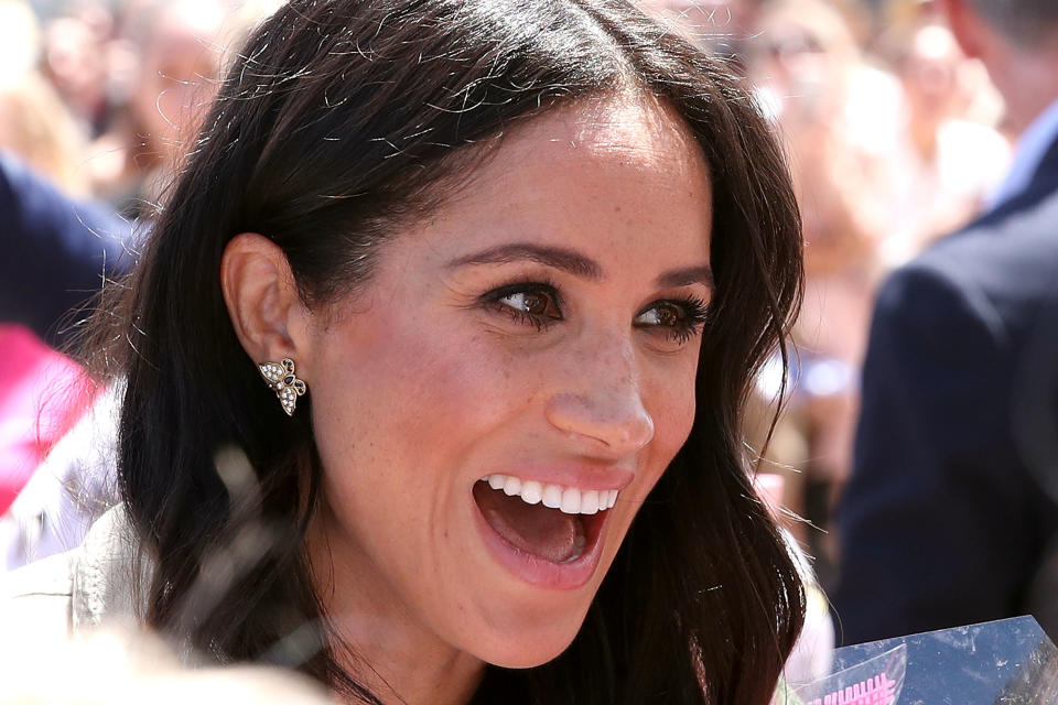 Meghan wore Princess Diana's earrings on the couples royal tour of Sydney, Australia. [Photo: Getty Images]