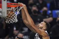 Utah Jazz center Rudy Gobert dunks during the first half in Game 6 of a second-round NBA basketball playoff series against the Los Angeles Clippers Friday, June 18, 2021, in Los Angeles. (AP Photo/Mark J. Terrill)