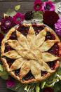 <p>This gorgeous treat balances tart cranberry flavors with sweet apples and cherries, and the end result is simply magical. </p><p><a href="https://www.goodhousekeeping.com/food-recipes/dessert/a35188/very-berry-apple-pie/" rel="nofollow noopener" target="_blank" data-ylk="slk:Get the recipe for Very Berry Apple Pie »;elm:context_link;itc:0;sec:content-canvas" class="link "><em>Get the recipe for Very Berry Apple Pie »</em></a></p>