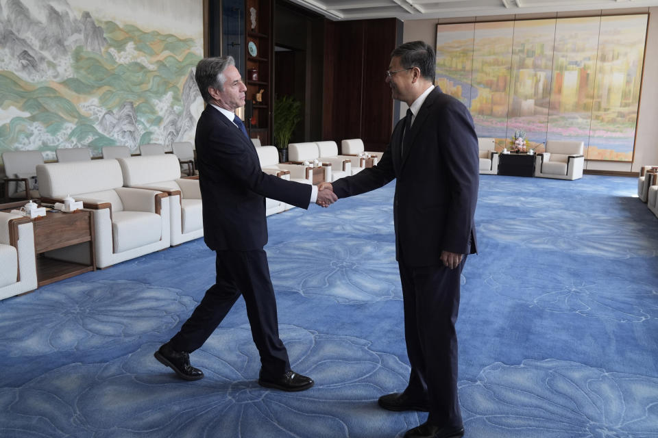 U.S. Secretary of State Antony Blinken, left, shakes hans with Shanghai Party Secretary Chen Jining as they meet at the Grand Halls, Thursday, April 25, 2024, in Shanghai, China. (AP Photo/Mark Schiefelbein, Pool)