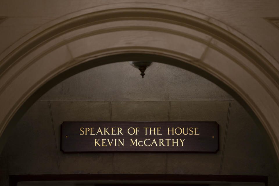 The name of Rep. Kevin McCarthy, R-Calif., remains on the sign at the entrance of the offices of the Speaker of the House on Capitol Hill, Wednesday, Oct. 4, 2023 in Washington, one day after he was ousted from the Speaker's position. (AP Photo/Mark Schiefelbein)