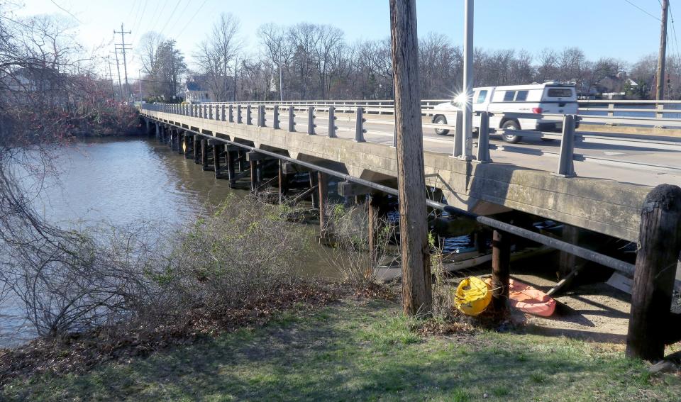 A car drives over the Corlies Avenue Bridge over Deal Lake between Allenhurst and Ocean Township is one of the bridges in Monmouth and Ocean County that have a "poor" rating. The structure is shown Friday, March 29, 2024.